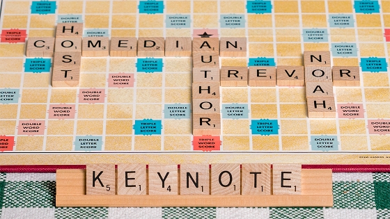 Scrabble Board with words Host Comedian Author Trevor Noah Keynote