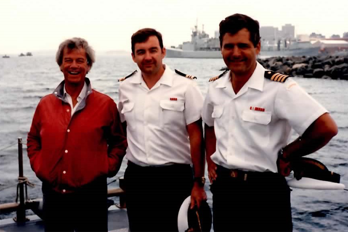 Canadian Actor Gordon Pinsent (Left), a LCdr (Centre), and Captain (Navy) Marc Garneau (Right))