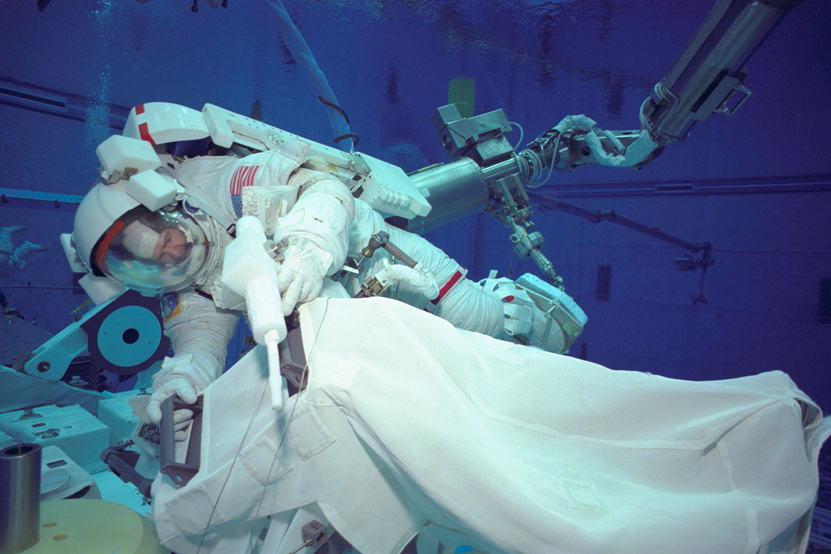 Marc Garneau training in the Neutral Buoyancy Laboratory (NASA)
